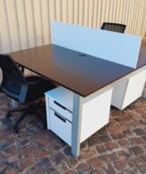 3acbf3b6 8106 4f3e b5f6 d88173c26bd6 scaled 1 American Walnut Two Way Cluster 1600mm x 1350mm - American walnut two way cluster desk with wooden screen divider and mobile pedestal 1600mm x 1350mm,chairs sold separately