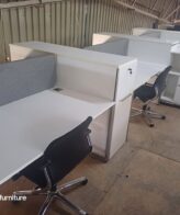 7b01fb3b 9f60 40ec b6b8 26fcb2c9bc02 6 Way Cluster Desk With Drawers 5850mm x 1500mm - White 6 way cluster with screen divider, steel frame legs and drawers 5850mm x 1500mm